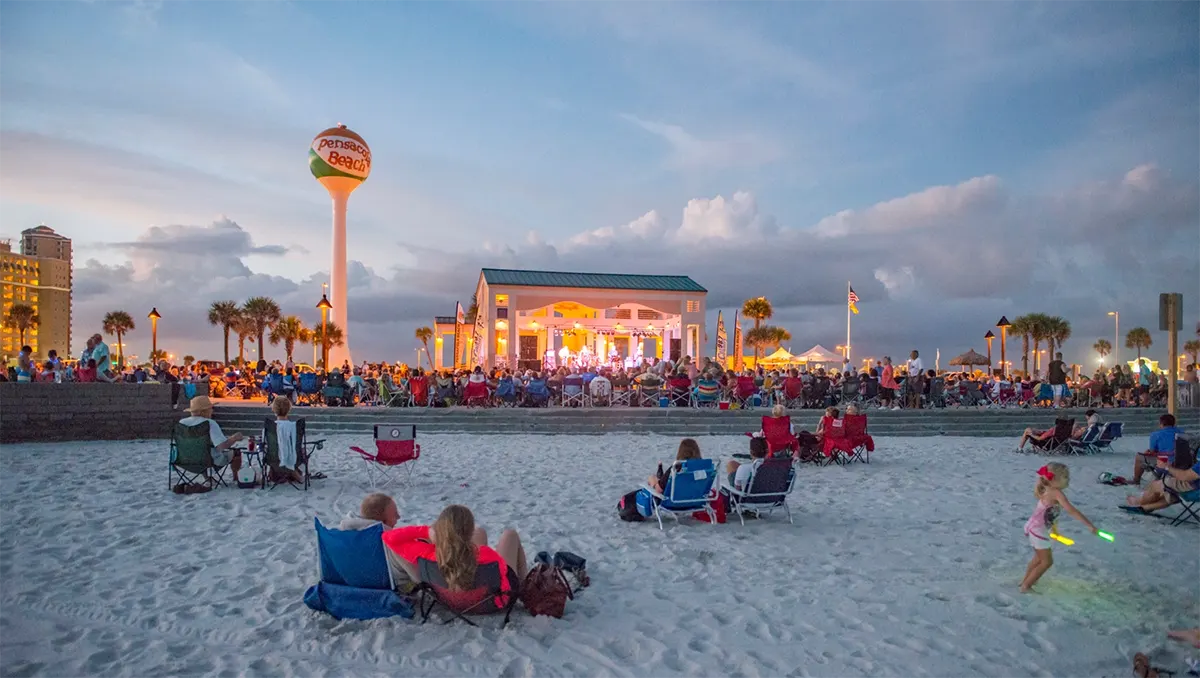 Night Time Event on the Beach in Front of the Water Tower | Air Conditioning Repair in Pensacola Beach | Emerald Coast Air Conditioning and Heating | AirConditioningRepairPensacola.com